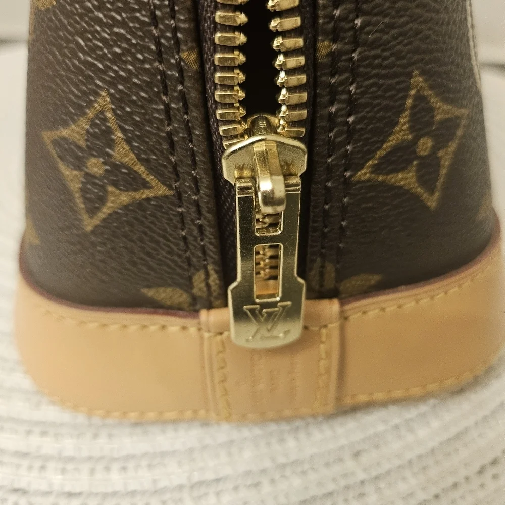 Louis Vuitton Alma BB World Tour Monogram Crossbody Bag